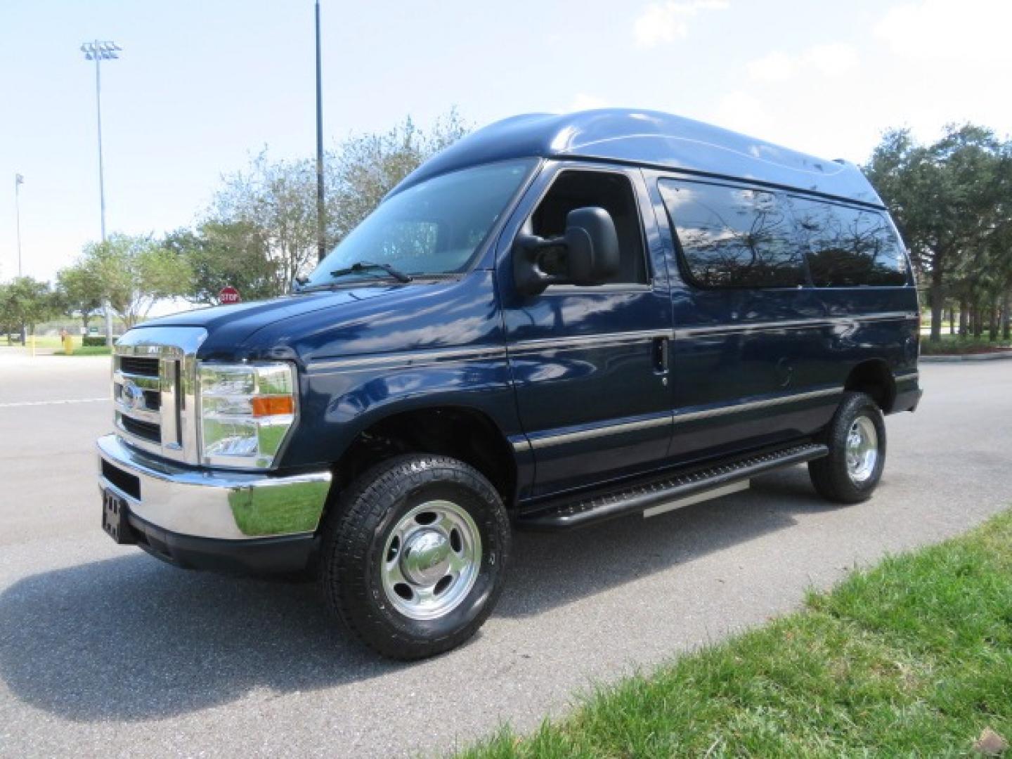 2011 Dark Blue /Gray Ford E-Series Wagon E-350 XLT Super Duty (1FBNE3BS4BD) with an 6.8L V10 SOHC 20V engine, located at 4301 Oak Circle #19, Boca Raton, FL, 33431, (954) 561-2499, 26.388861, -80.084038 - You are looking at a Gorgeous 2011 Ford Econoline E350 XLT Norcal Max High Top Handicap Wheelchair Conversion Van with 6.8L V10, 15K Original Miles, 9 Inch Lowered Floor, Braun UVL Side Entry Wheelchair Lift, Remote Control Power Side Entry Doors, Expanded Side Entry Doors, Q Straint Tie Down, Syste - Photo#10